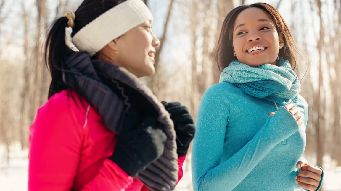 women exercising outdoors in cold weather
