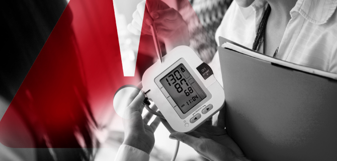 Photo with blood pressure cuff and exclamation mark