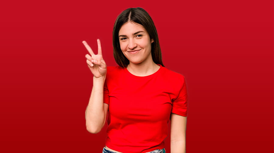 Woman in red with the number 2 held up