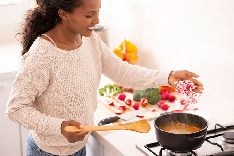 woman cooking easy winter meals