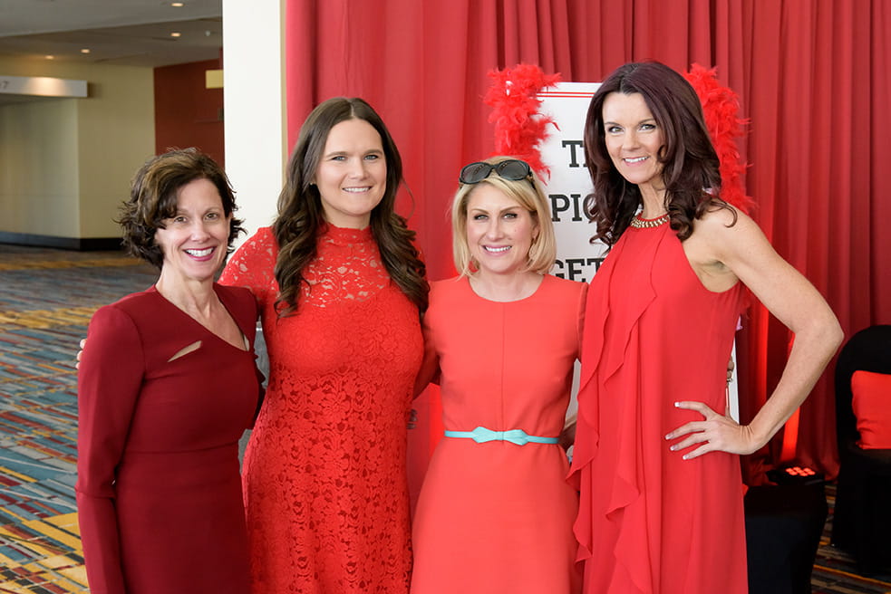 Women wearing red at the Go Red Luncheon