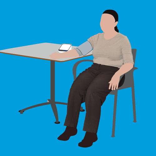 woman taking blood pressure
