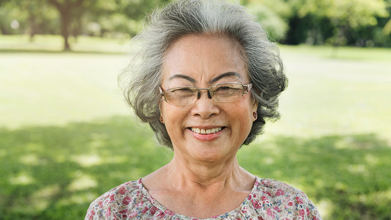 senior Asian woman smiling