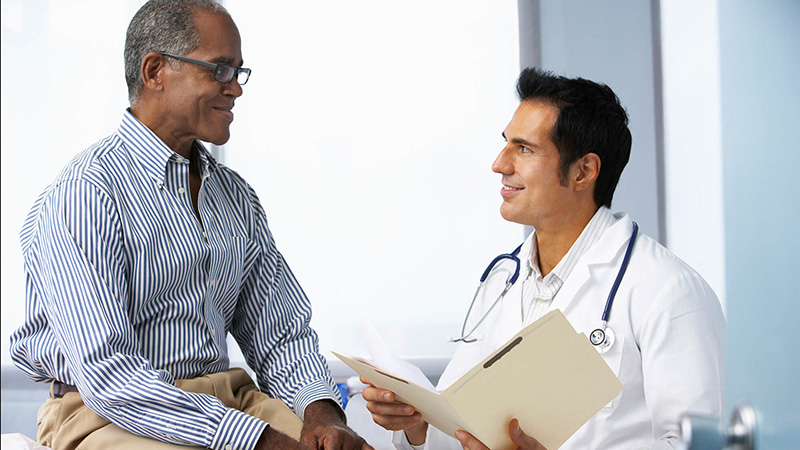 doctor talking to patient