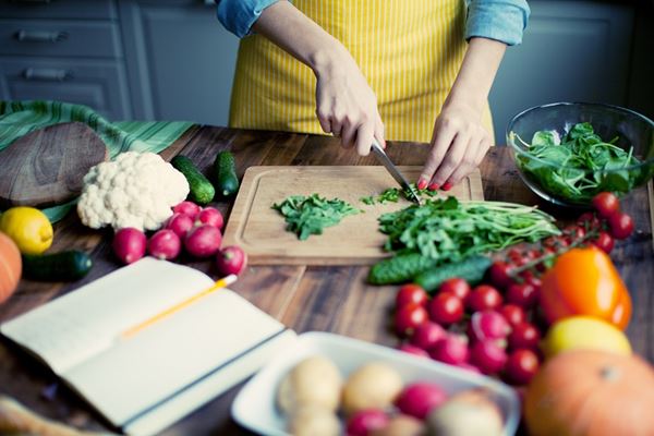 Woman chopping vegetables