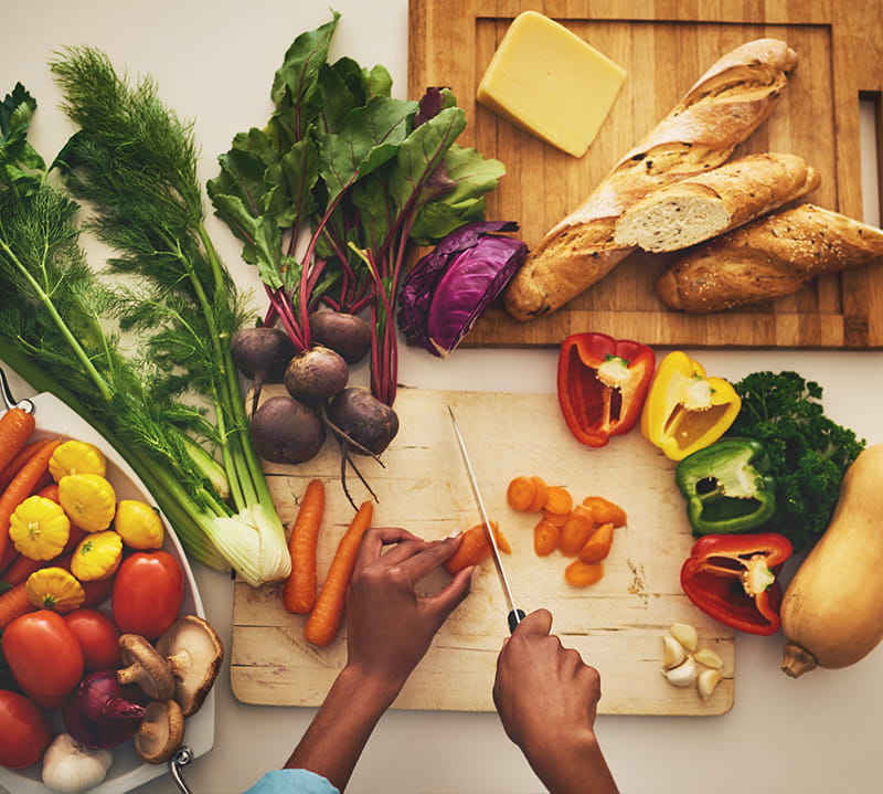 hands chopping vegetables
