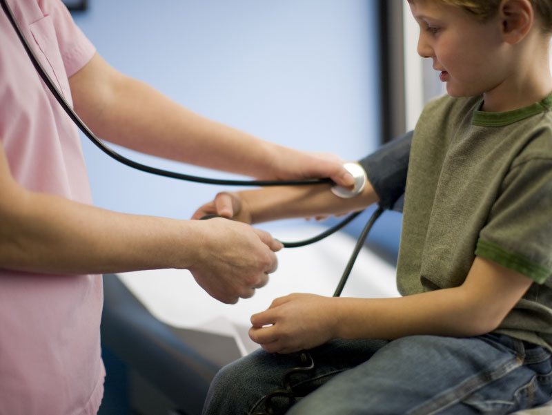Child having blood pressure checked. (Rana Faure, Getty Images)
