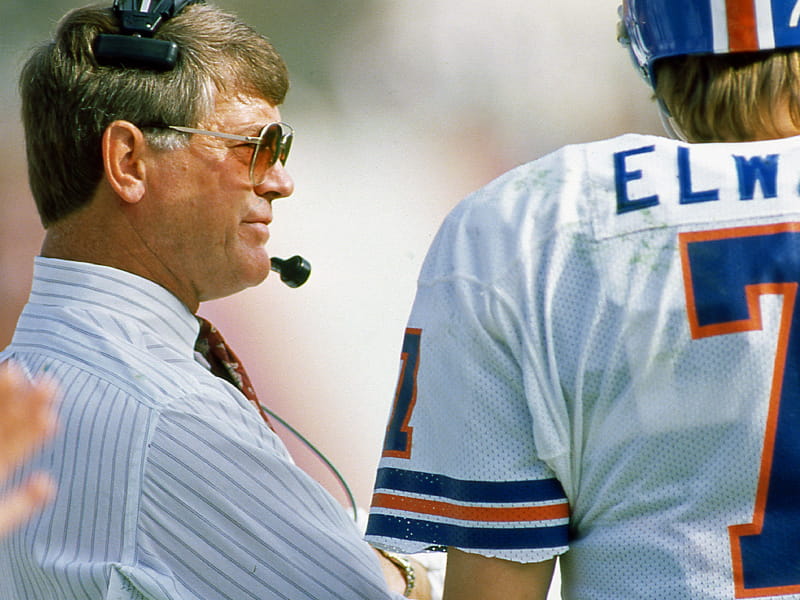 Former coach Dan Reeves on the sideline with former Denver Broncos player John Elway. (Owen C. Shaw, Getty Images)