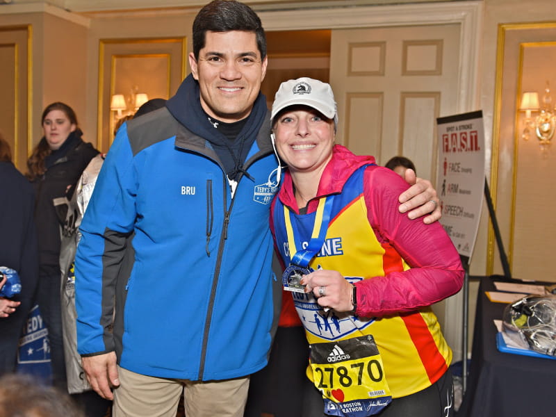 Tedy Bruschi at the 2018 Boston Marathon with Tedy’s Team alumna Christine Pelletier