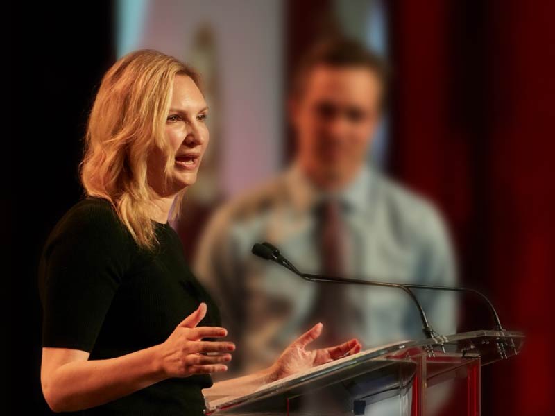Heart disease survivor Jara Herron shares her experience at a Go Red For Women luncheon. (Photo courtesy of Jara Herron)