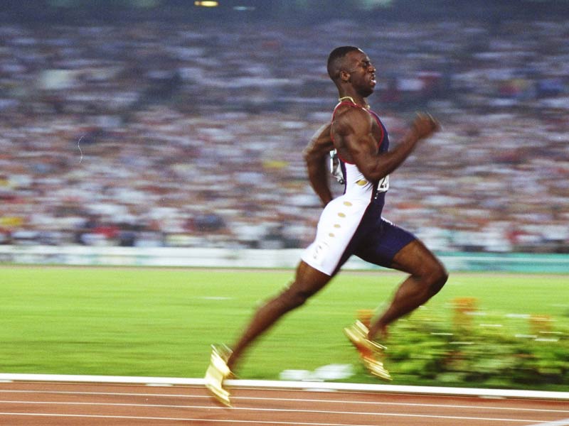 Michael Johnson during the men’s 200-meter race at the 1996 Olympic Games in Atlanta. (Photo by Tony Duffy/Allsport, Getty Images)