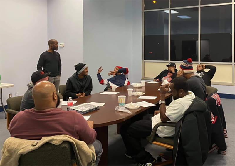 A group of fathers at an InvolvedDad's IMPACT program session in February 2020. (Photo courtesy of InvolvedDad)