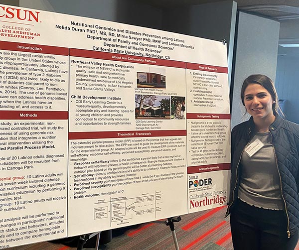 Lorena Melendez-Chavez presents her research poster at the Community-Academics Partnerships Conference at California State University, Northridge, in February.  (Photo by Nelida Duran, assistant professor in the Department of Family and Consumer Sciences)