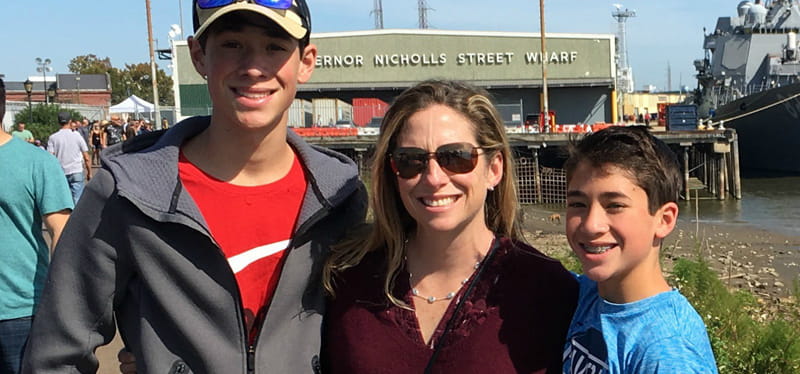 Cardiac arrest survivor Stephanie Austin with her sons Alec (left) and James, who were at home when their father called 911 and performed CPR. (Photo courtesy of Stephanie Austin)