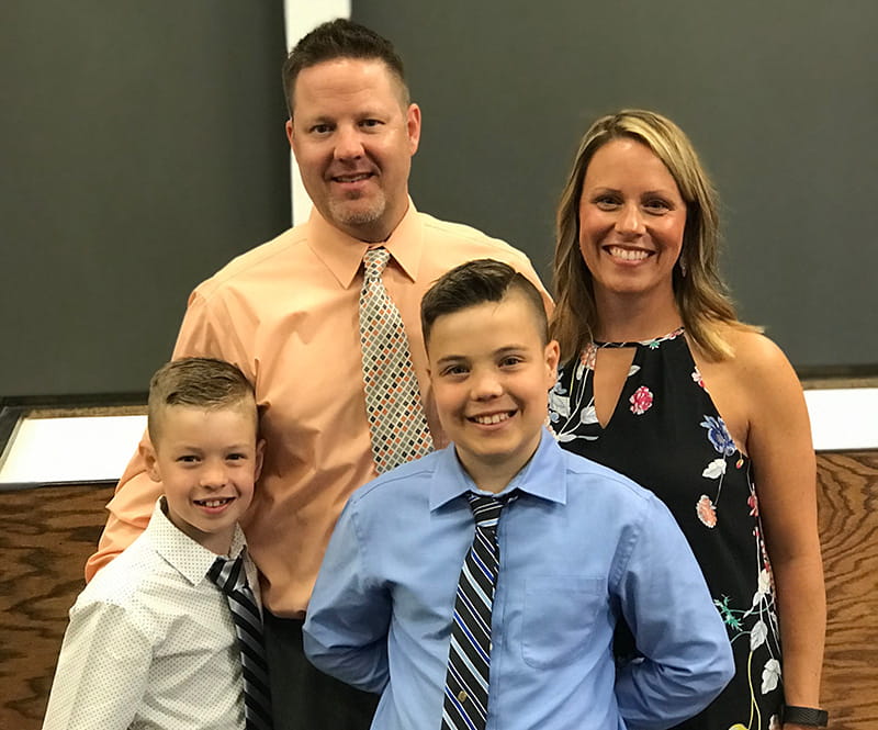 Kelly Naab with her husband and sons, from left: Ryder, Tim, Cooper, and Kelly. (Photo courtesy of Kelly Naab)