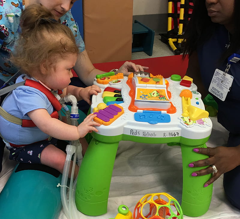 Tessa in physical therapy at the University of Maryland Medical Center. (Photo courtesy of Courtney Agnoli)