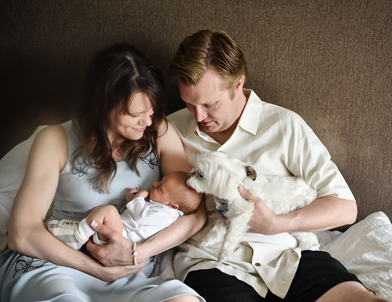 Tess Kossow with her family, clockwise from left: Tess, husband Dan, Mr. Big and son, Ferris. (Photo by Lindsay Chan Photography)
