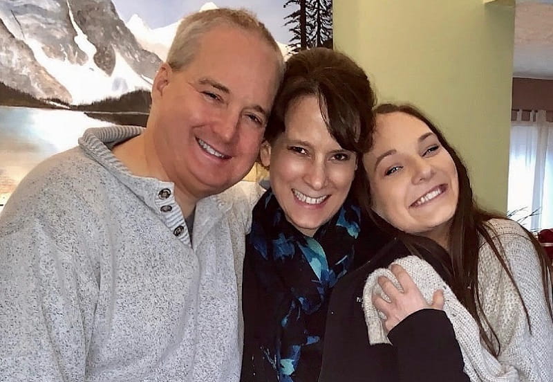 Cardiac arrest survivor Sydney Ridlehoover with her stepfather, Peter, and mom, Tracy.