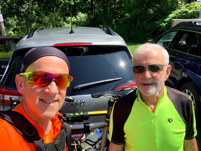 Tim (left) and Dick Connery in 2019, upon completing their first bike ride together after Tim's stroke. (Photo courtesy of Tim Connery)