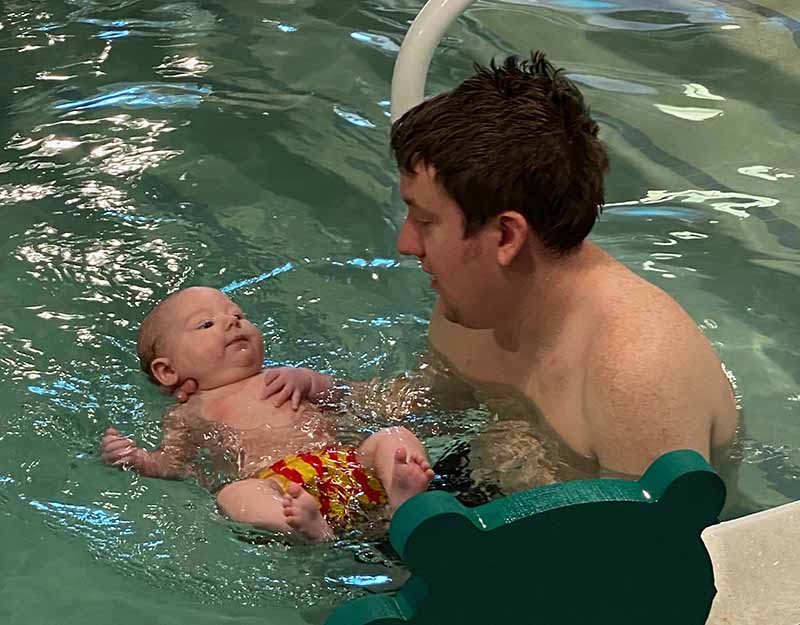 Tyler Morgan with Beckham at infant swim lessons. (Photo courtesy of Tyler Morgan)