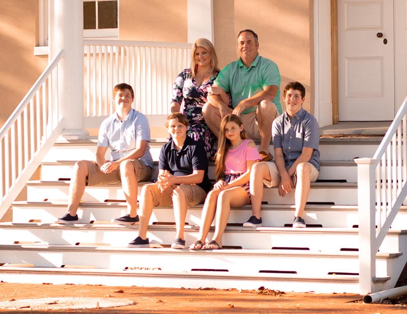 Katie Moegenberg with her family. Clockwise from top left: Katie, Matthew, Joseph, Emma, Griffin and Matthew. (Photo by Blair Davis Photography)