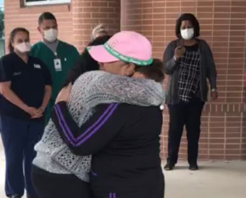 Marranda Edwards embraces her mother, Alvis Whitlow, for the first time since Whitlow was admitted to the hospital with COVID-19. (Photo courtesy of Marranda Edwards)