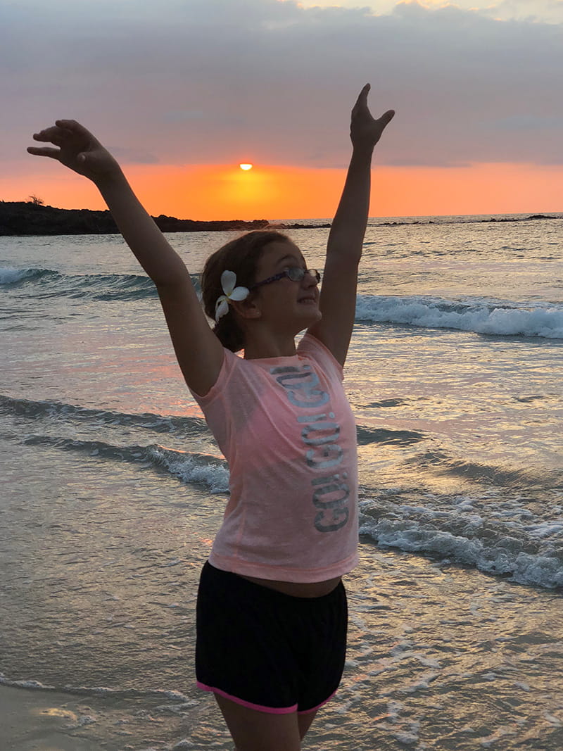 Lara has incorporated more physical activity in her life in addition to her strict diet. She enjoys ballet and shows off a pose on the beach at sunrise. (Photo courtesy of Federico Asch)
