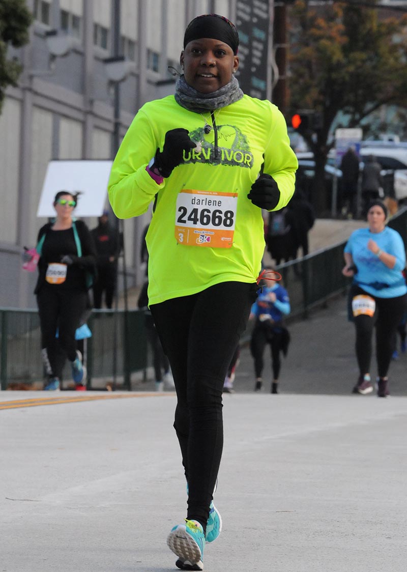 Darlene Anita Scott running an 8K in Virginia in 2019. (Photo by MarathonFoto)