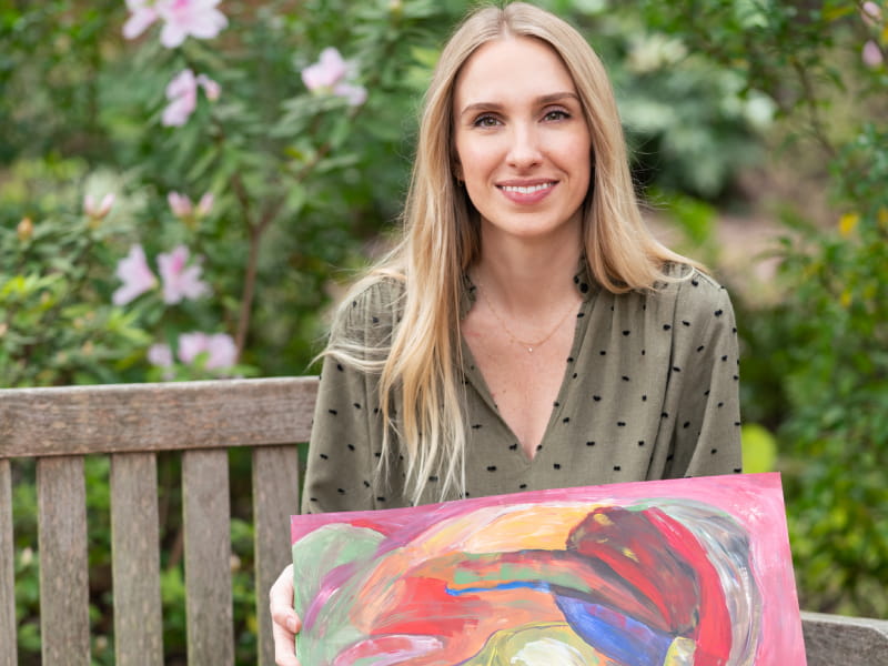 Katie Hinson had open-heart surgery at age 5. Combining her love for art and helping others, Hinson organizes Strokes for Strokes, a workshop where stroke survivors and caretakers can create art and share their stories. (Photo by Abby Murphy Photo)