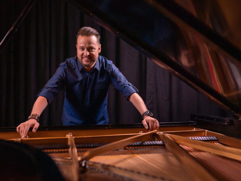 Pianist Paul Cardall was born with a congenital heart defect and he now heals others' hearts through his music. (Photo by Erin Morris Huttlinger)