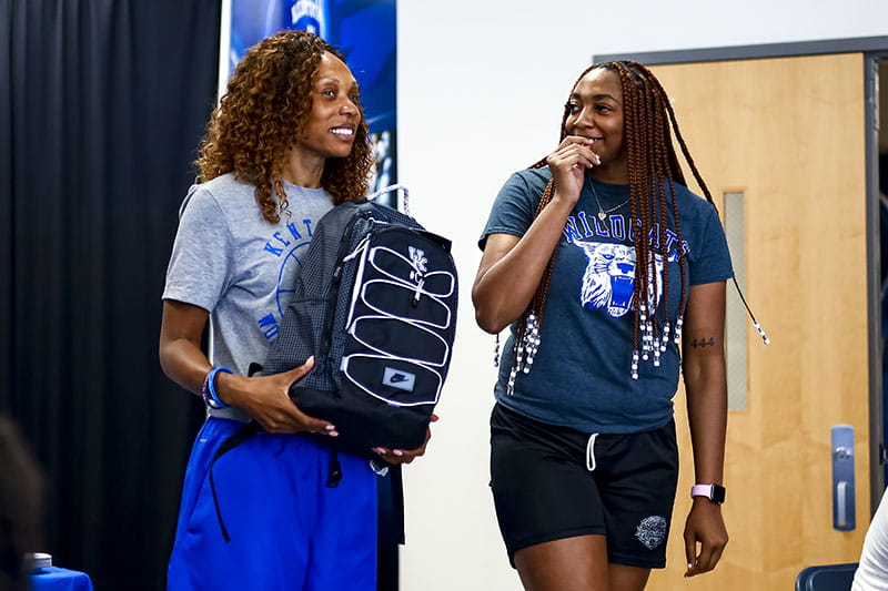 Tionna Herron (right) with head coach Kyra Elzy. (Photo courtesy of University of Kentucky Athletics)