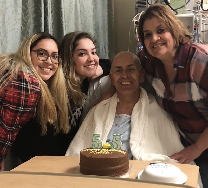 Eddie Garcia with his family the morning of surgery to implant a left ventricular assist device. From left: Daughters Erica and Marisa, Eddie, and wife Sandra. (Photo courtesy of Eddie Garcia)