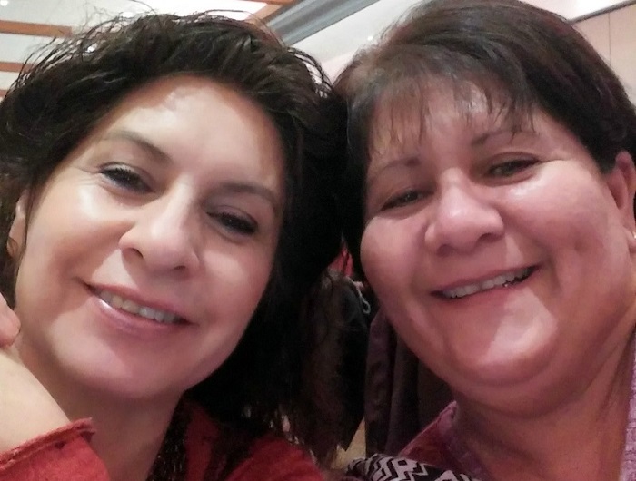 Heart attack survivor Barbara Marquez (right) with her sister Yolanda at a Go Red For Women Native American event in 2017. (Photo courtesy of Barbara Marquez)