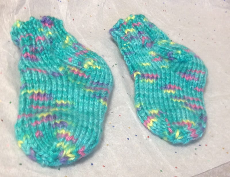 After a stroke, Diana Washburn re-learned to knit baby booties, her specialty. (Photo courtesy of Diana Washburn)