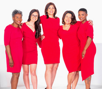 diverse group of women in red dresses