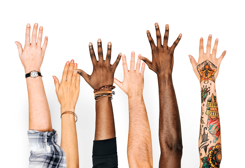 diverse group of hands raised in the air