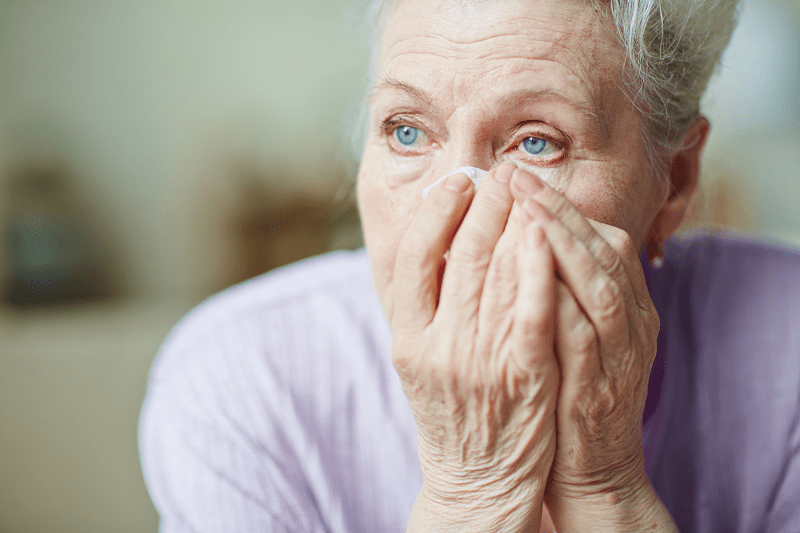 Older woman crying