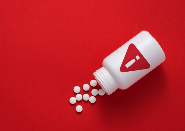 Pills on a red background