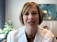 Tracy E. Madsen, MD, PhD talking on a video call from her office