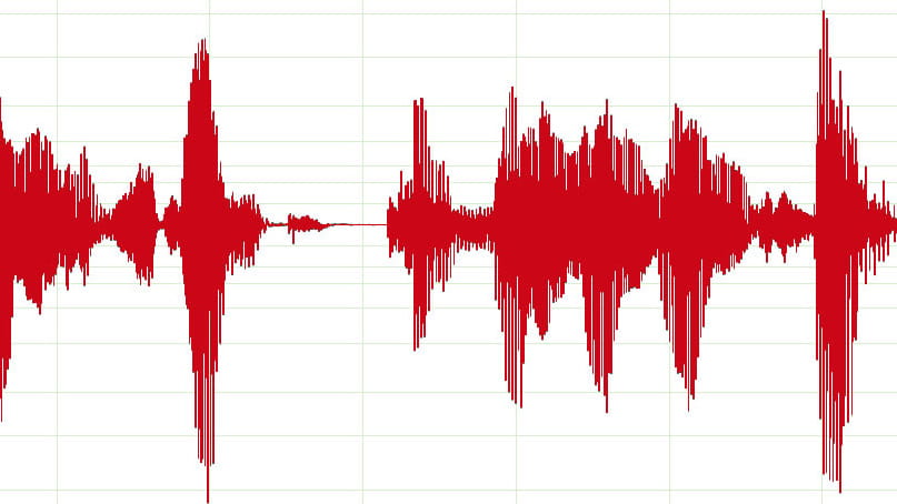 A red speech recording waveform