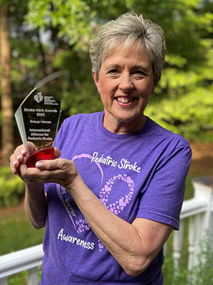 Mary Kay from IAPS with the 2022 Stroke Hero Group award