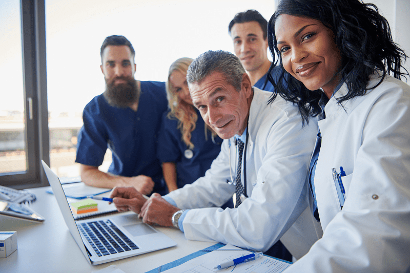 Team of doctors looking at the camera