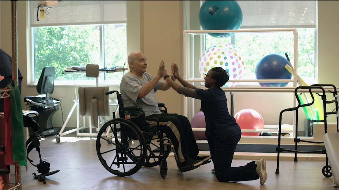 patient engaging with rehab professional