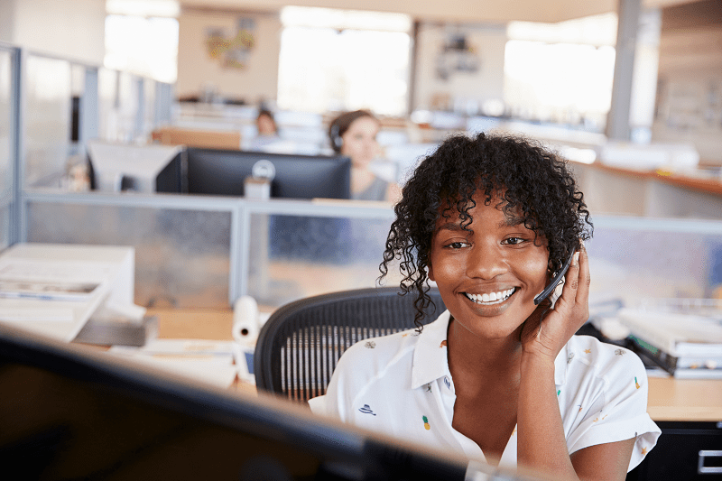 woman working in a call centre answering phone