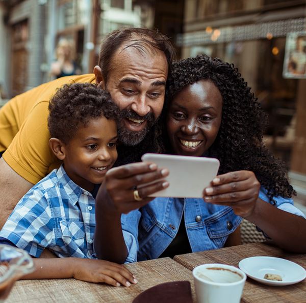 happy family taking selfie