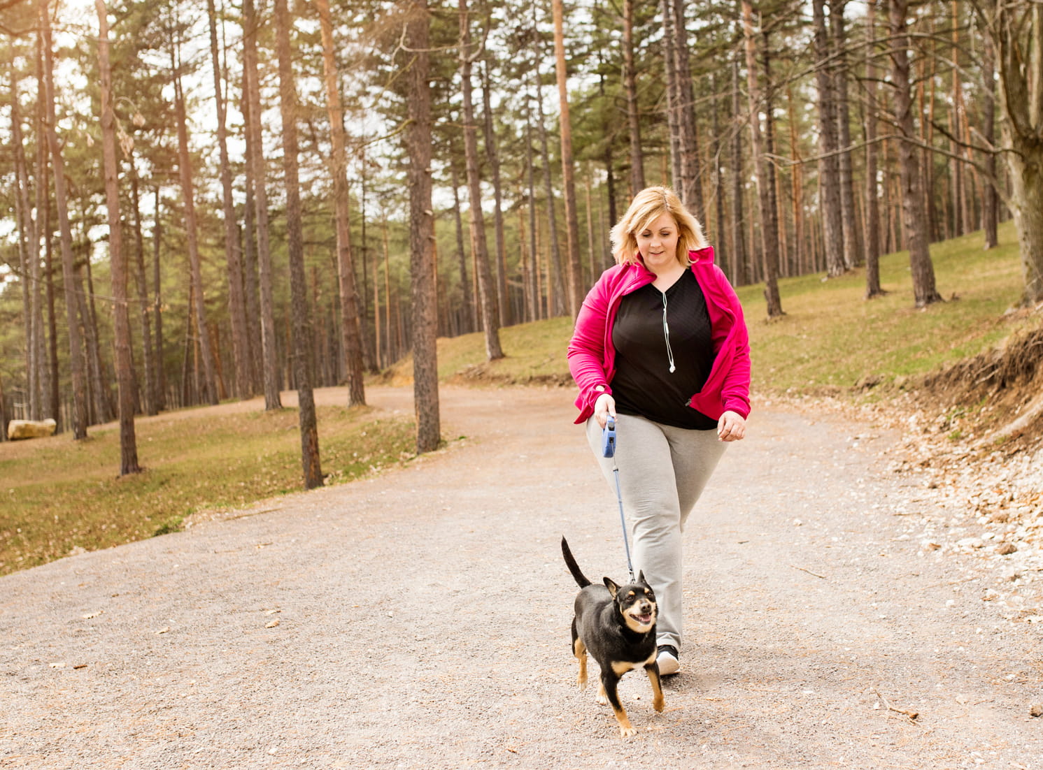 woman exercising with dog woman exercising with dog