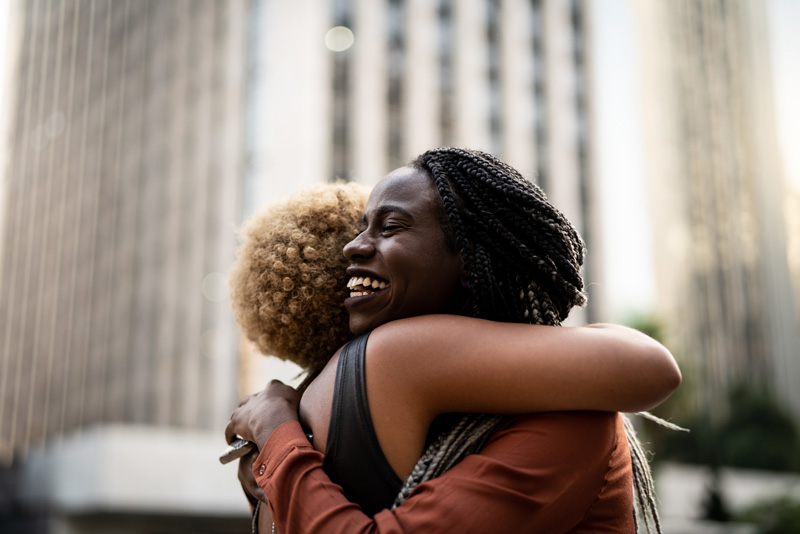 Two women hugging