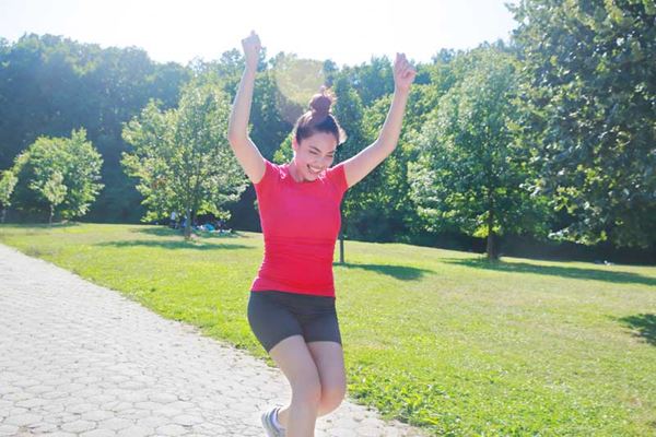 Woman jumping for joy