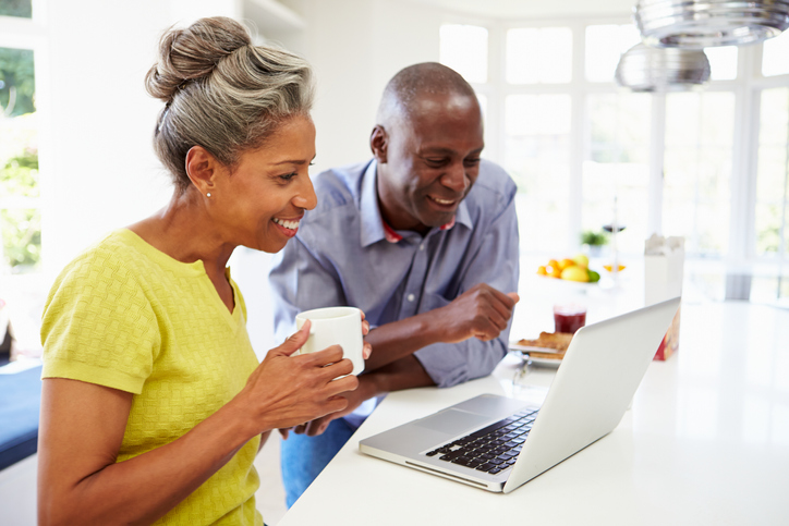 Mature couple on laptop