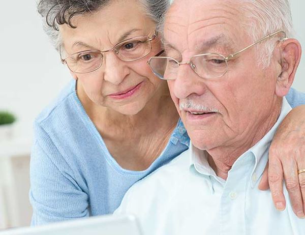 Older couple surfing web